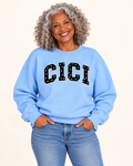 CICI Light Blue Polka Dot Crewneck on older Black woman
