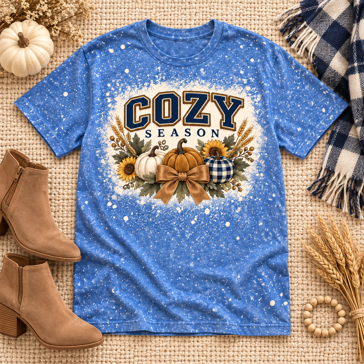 Blue bleached Cozy Season pumpkin graphic tee flat lay