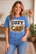 Woman wearing blue bleached Cozy Season pumpkin graphic tee