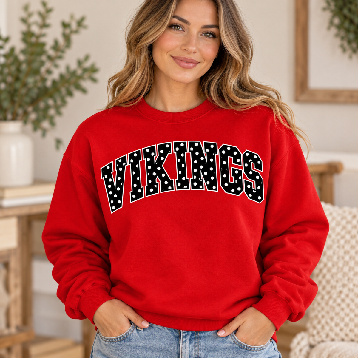 Woman modeling red Petersburg Vikings polka dot crewneck