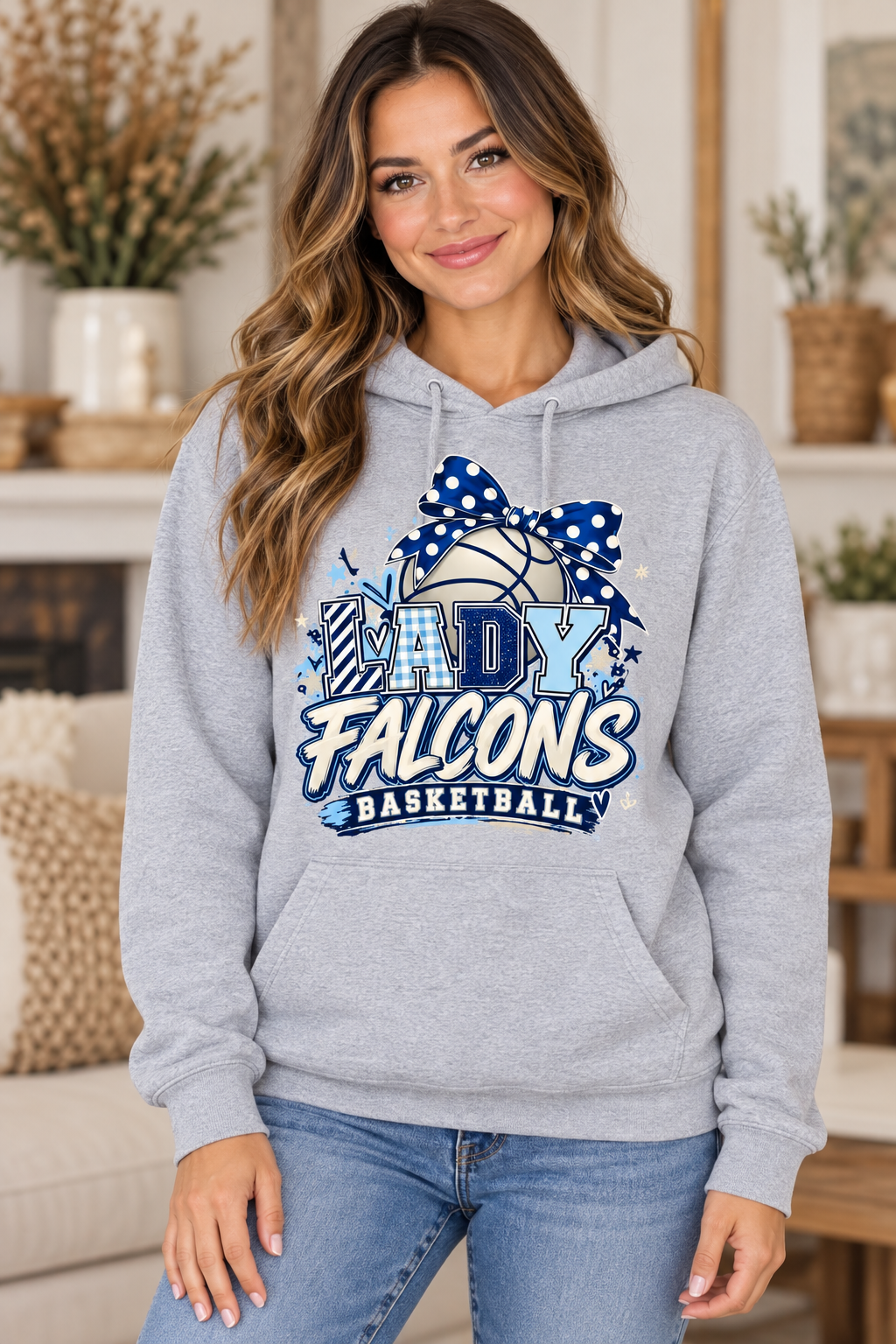 Model wearing Heather Gray Lady Falcons Basketball Polka Dot Bow Hoodie