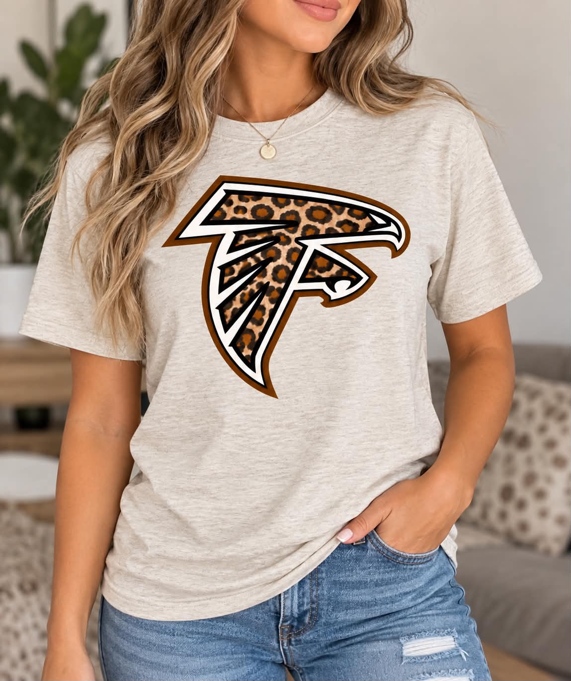 Ash Falcons leopard logo T-shirt modeled by a woman