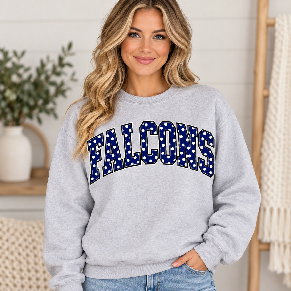 Woman wearing ash gray Falcons polka dot crewneck