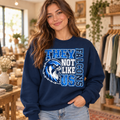 Model wearing navy Falcons They Not Like Us crewneck