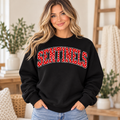 Woman wearing black Fort Hill Sentinels polka dot crewneck