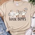 Goose Bumps volleyball geese design on a cream T-shirt