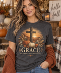 Woman wearing charcoal Grace Changes Everything fall faith graphic tee
