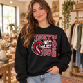 Boutique model in Hawks They Not Like Us black crewneck