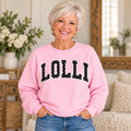 LOLLI Pink Polka Dot Crewneck on older woman