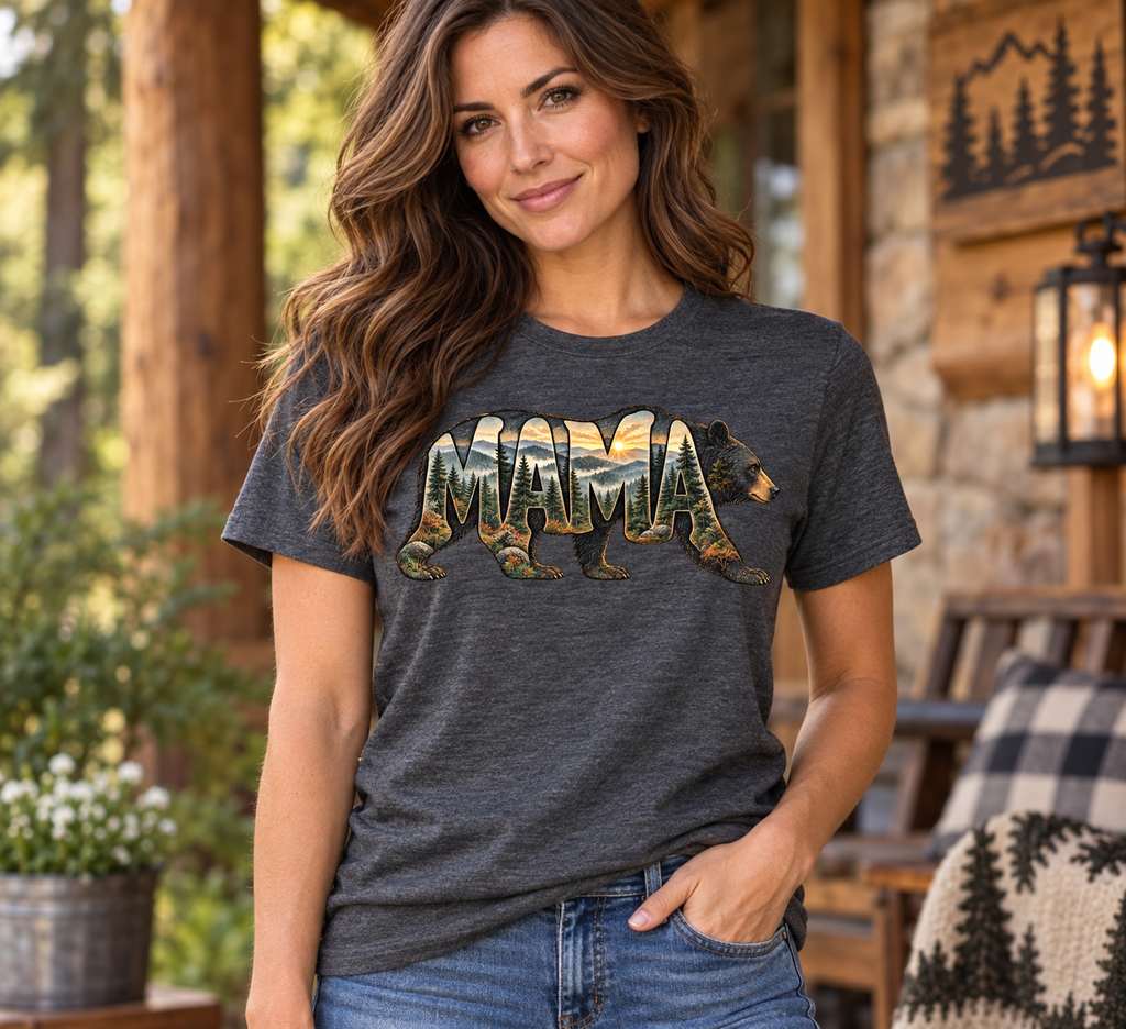 Woman wearing Dark Heather MAMA bear forest graphic tee