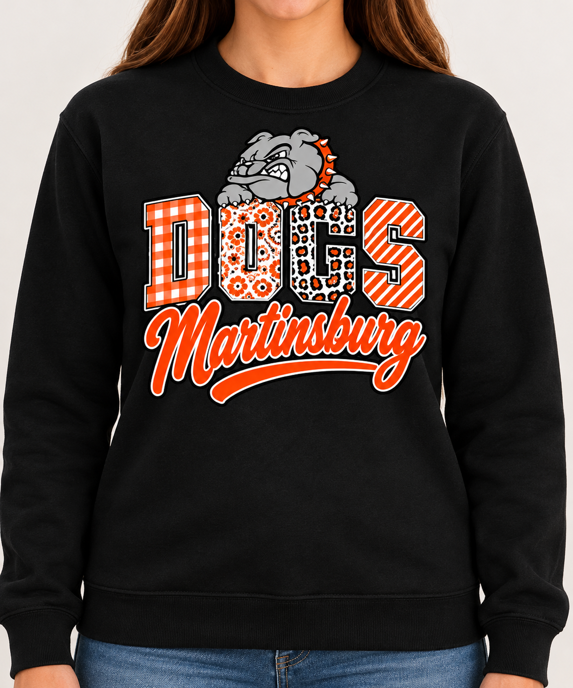 Orange patterned DOGS with bulldog mascot and Martinsburg script on black crewneck