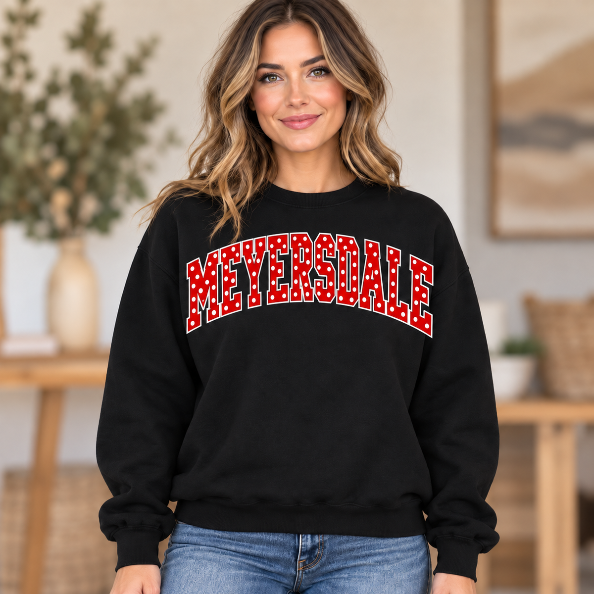 Woman wearing black Meyersdale polka dot crewneck