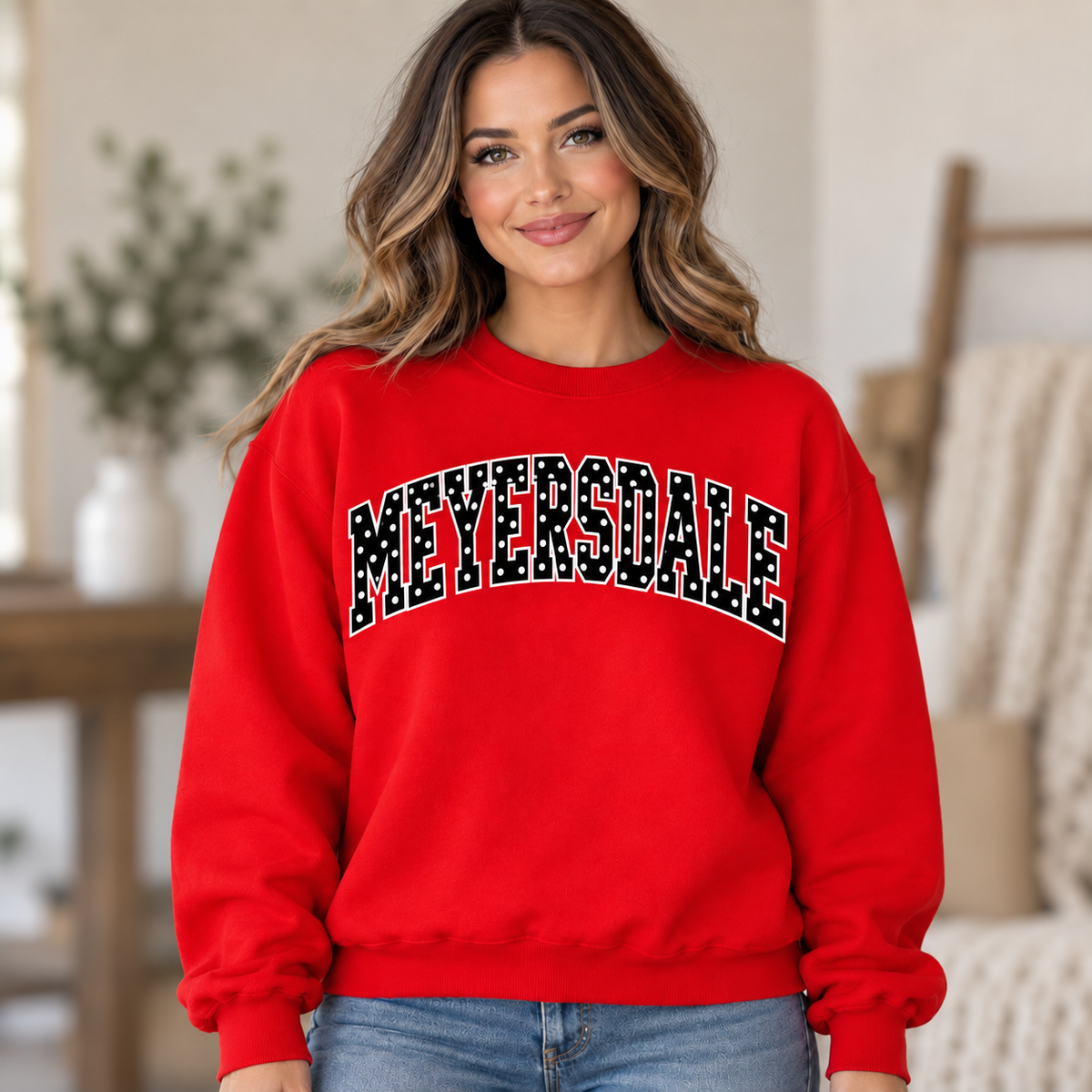 Woman wearing red Meyersdale polka dot crewneck
