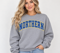 Model wearing heather gray NORTHERN polka dot crewneck
