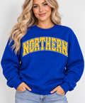 Model wearing royal blue NORTHERN polka dot crewneck