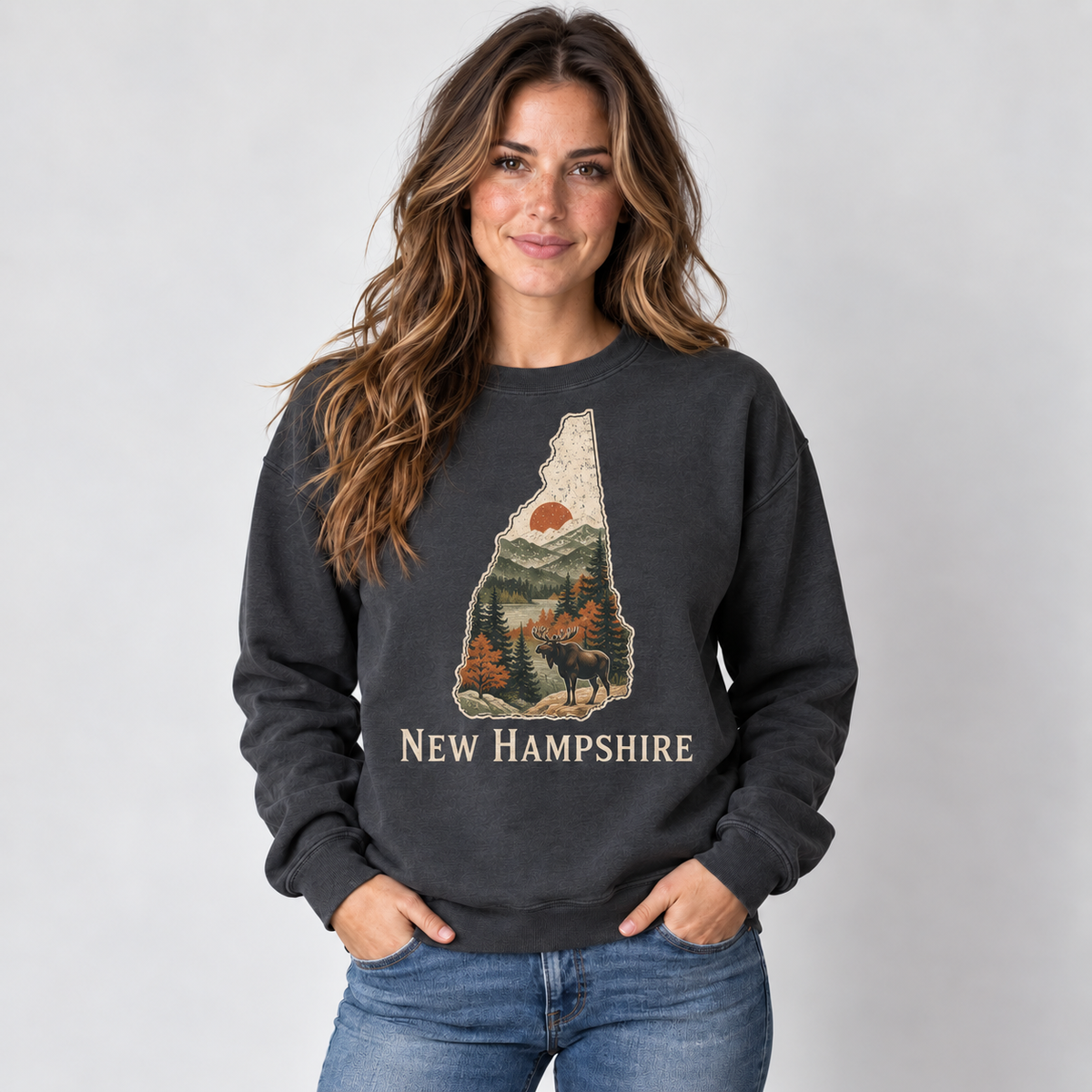 New Hampshire outdoor heritage design on a charcoal crewneck