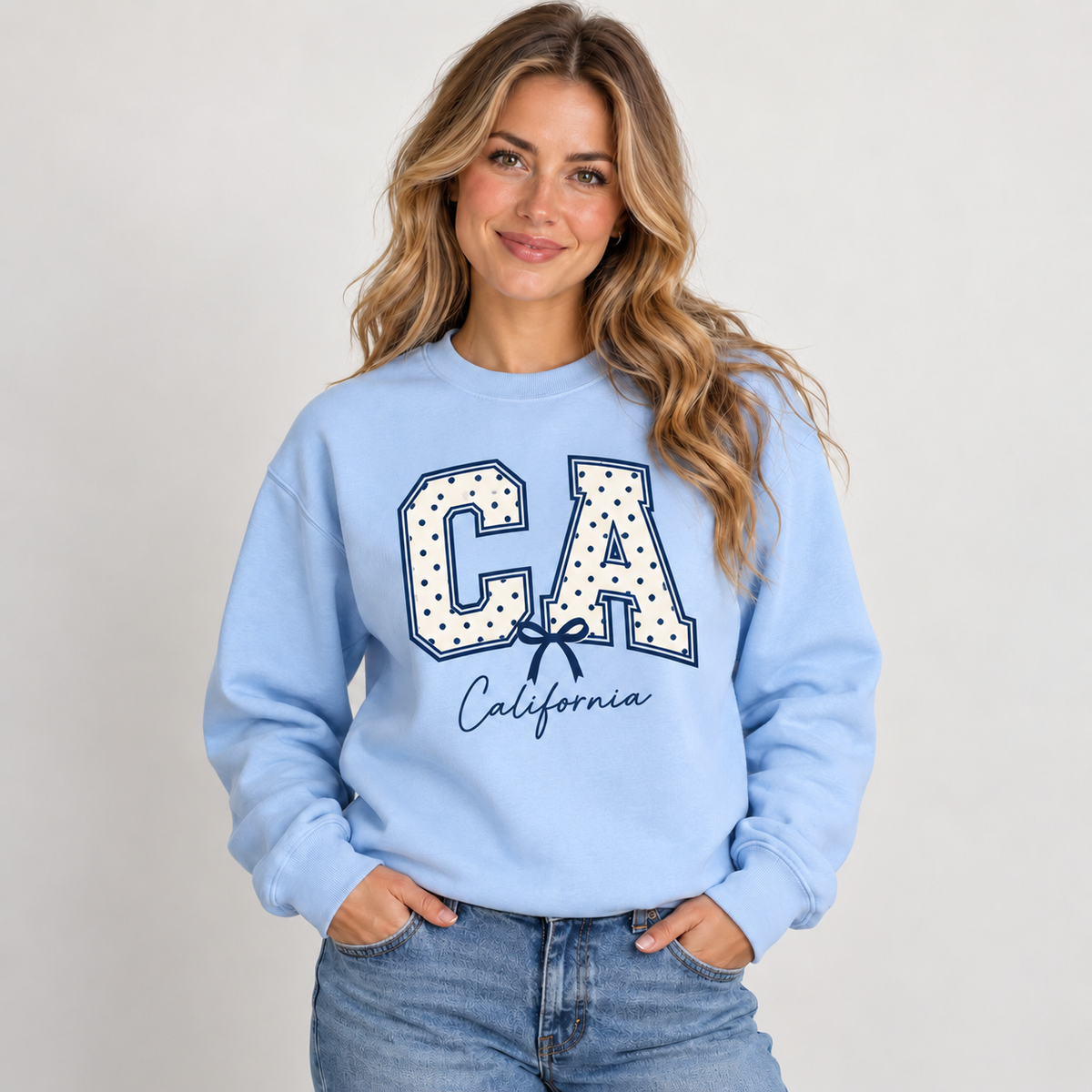 California polka dot varsity design on a light blue crewneck