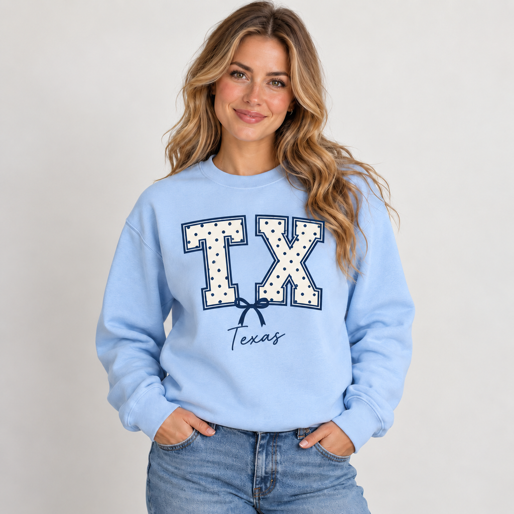 Texas polka dot varsity design on a light blue crewneck