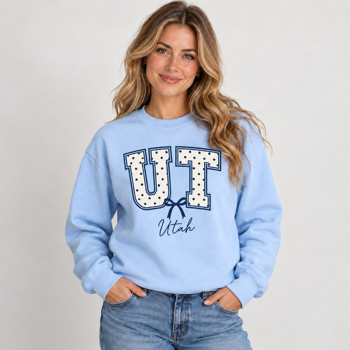 Utah polka dot varsity design on a light blue crewneck