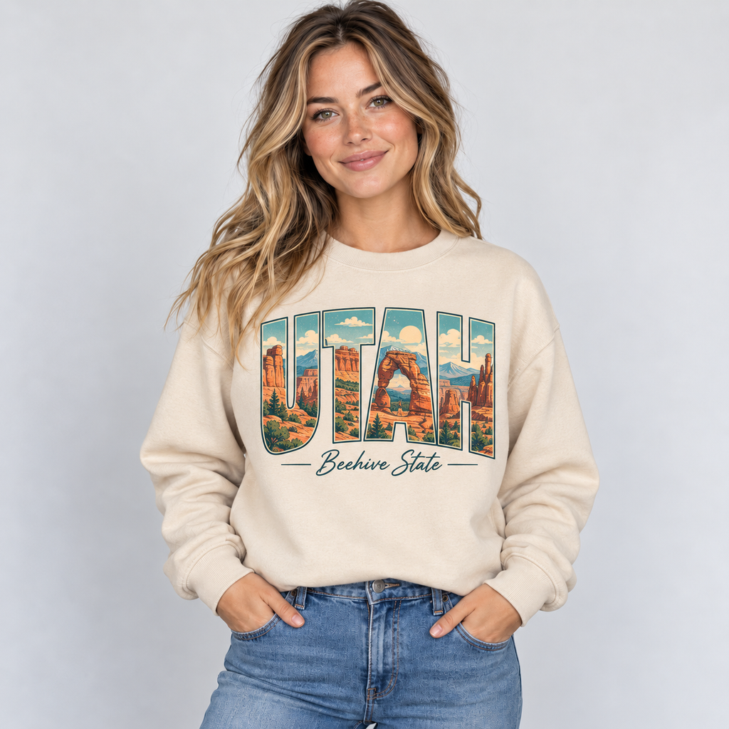 Utah vintage postcard design on a sand crewneck