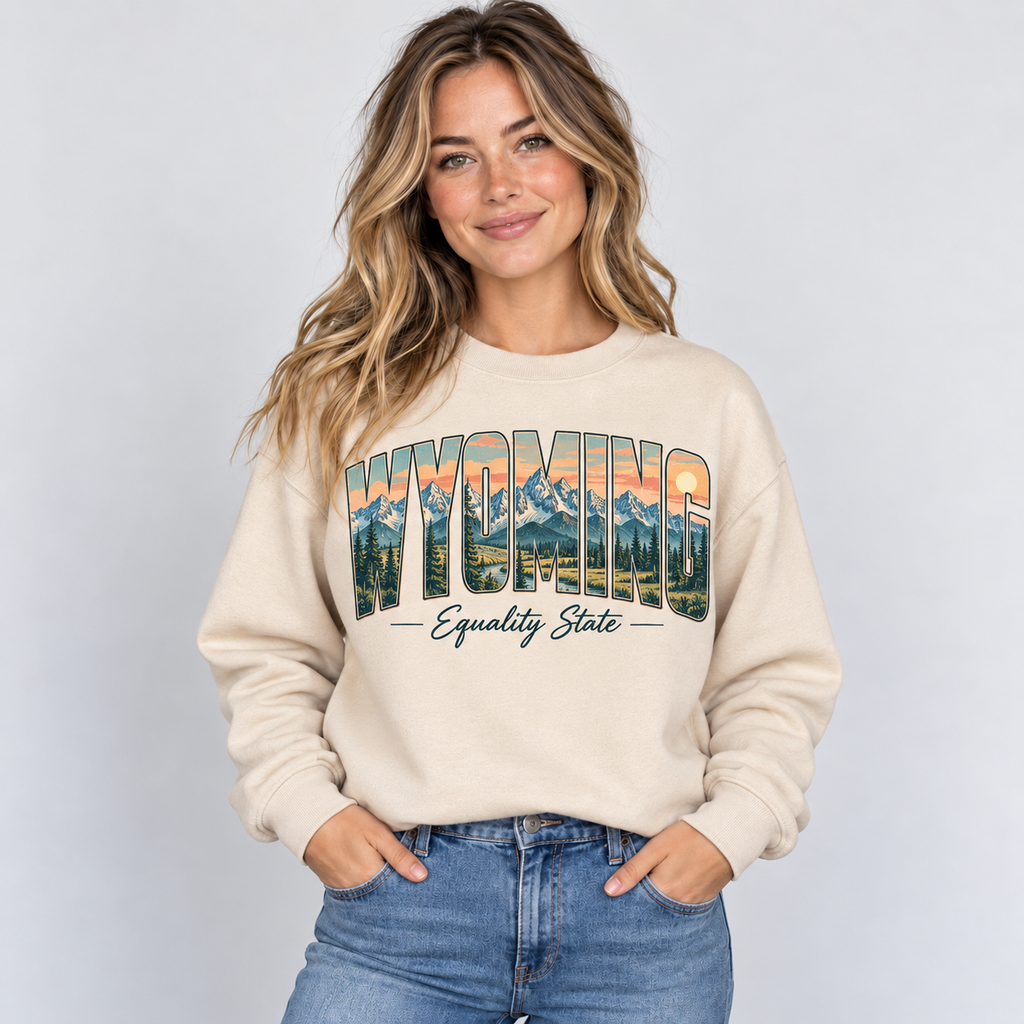 Wyoming vintage postcard design on a sand crewneck