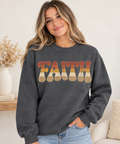 Woman wearing Dark Heather retro FAITH crewneck