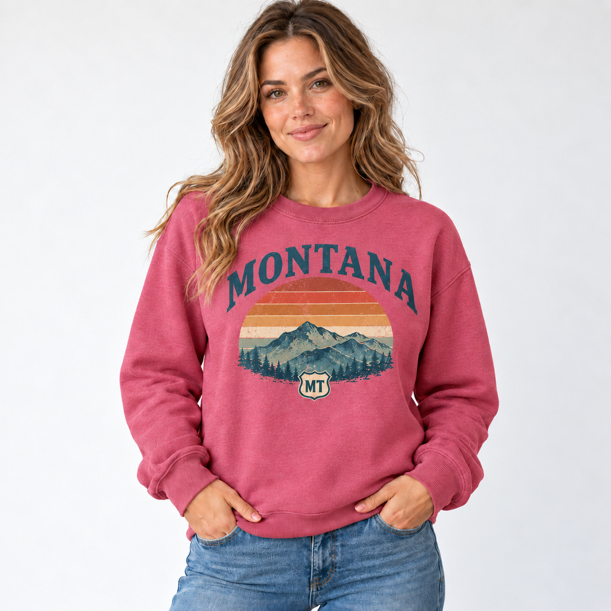 Montana retro road trip design on a Heather Sport Scarlet Red Gildan G180 crewneck