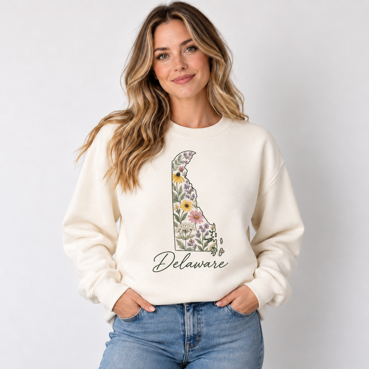 Delaware wildflower design on a cream crewneck
