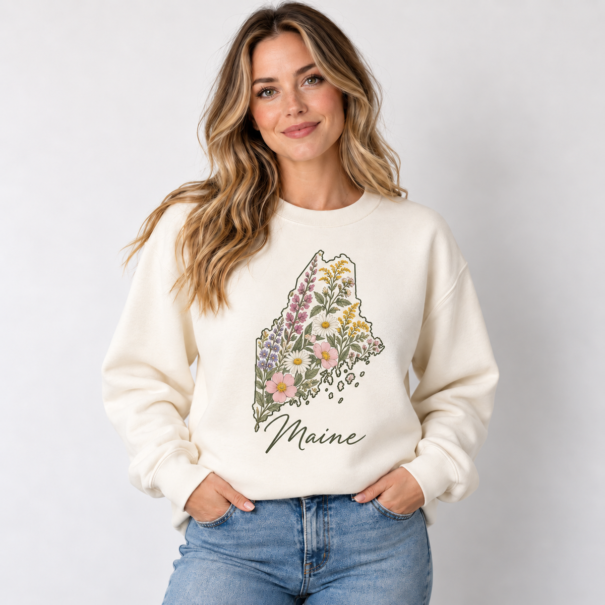 Maine wildflower design on a cream crewneck