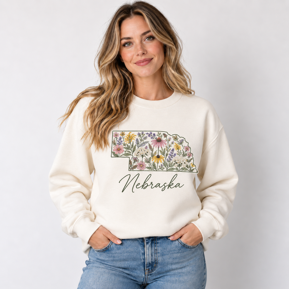Nebraska wildflower design on a cream crewneck