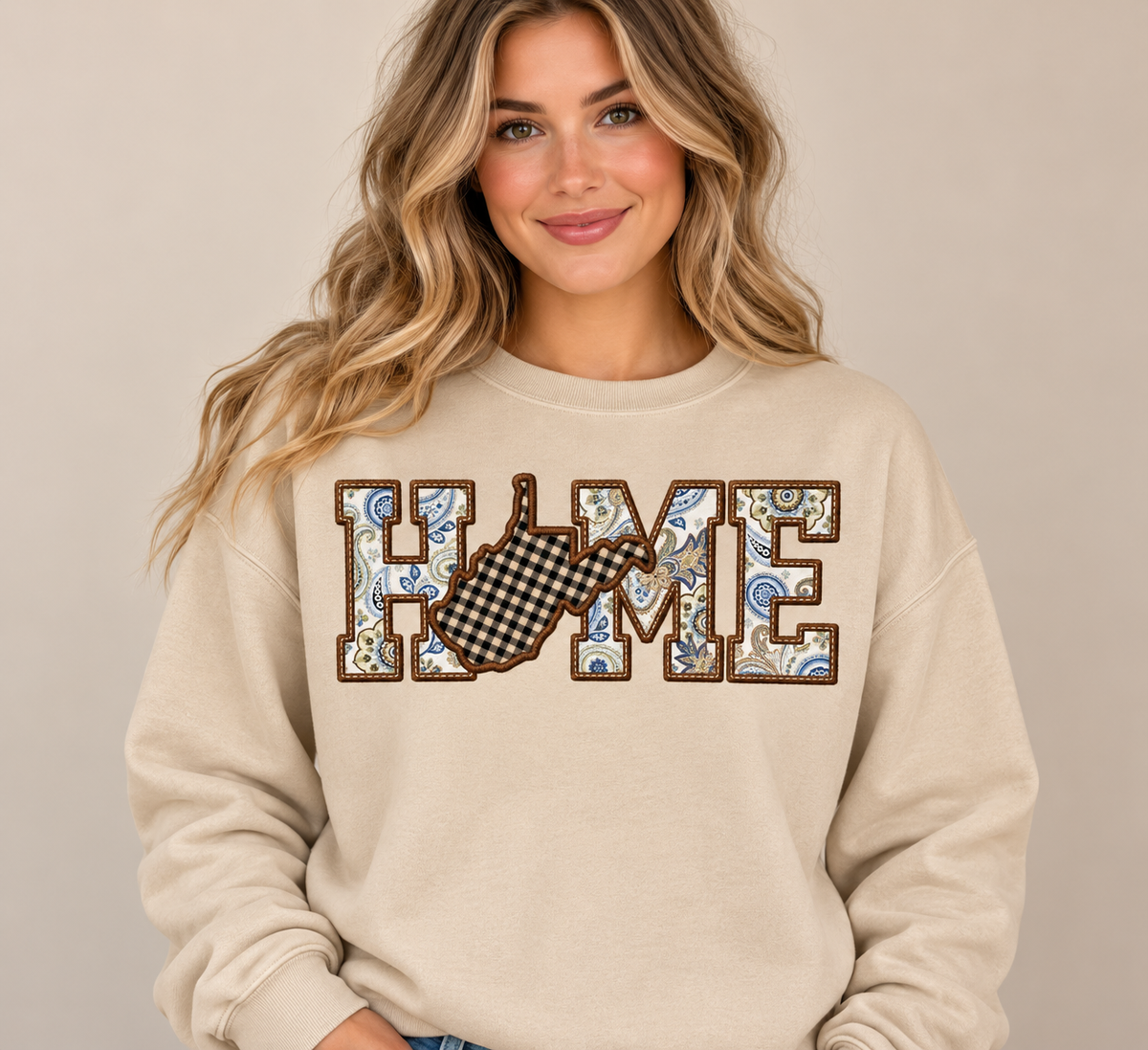 Woman modeling sand HOME West Virginia crewneck