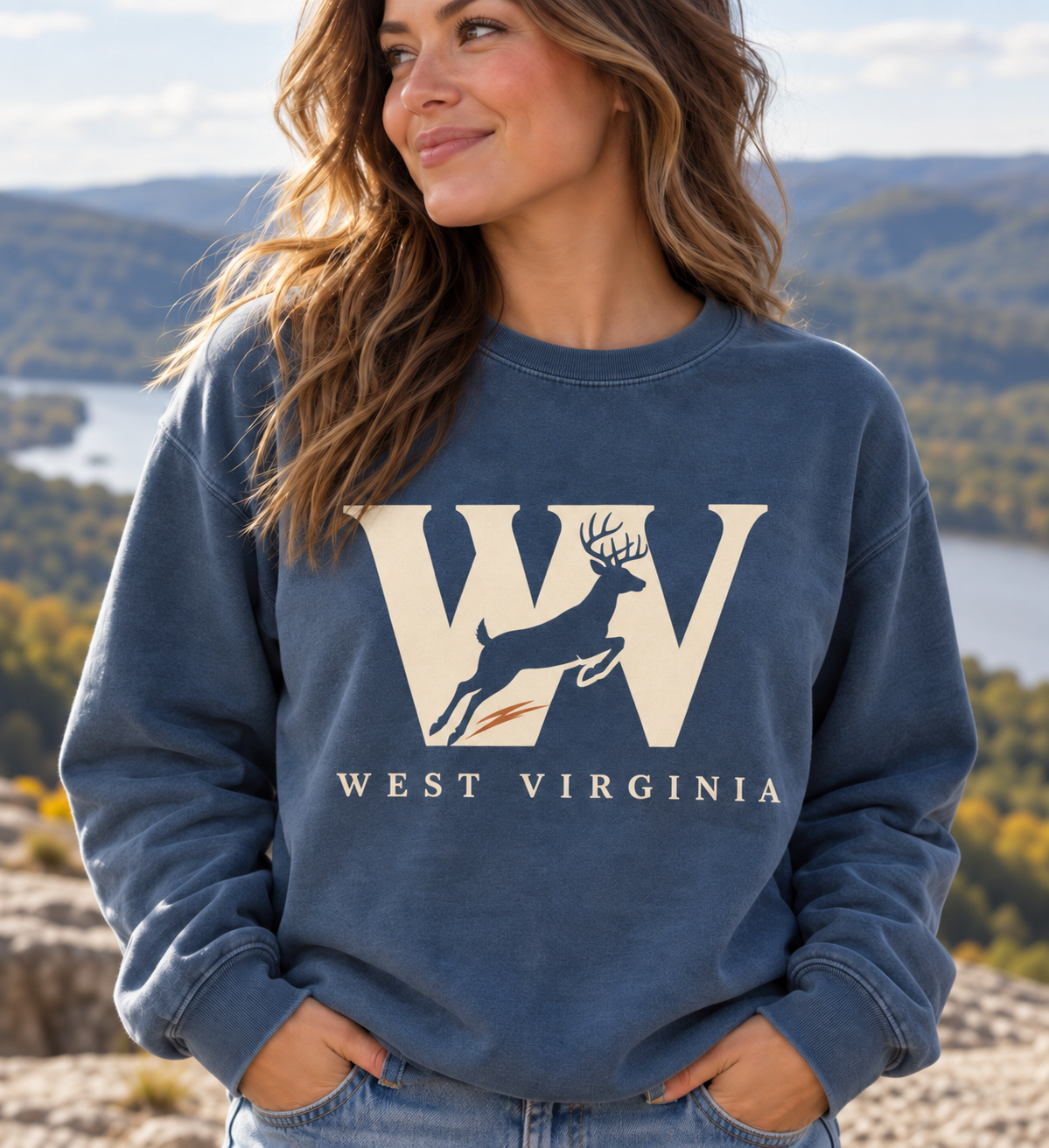 Woman modeling blue WV leaping whitetail buck crewneck