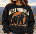 Woman modeling black West Virginia Mountain Made black bear crewneck