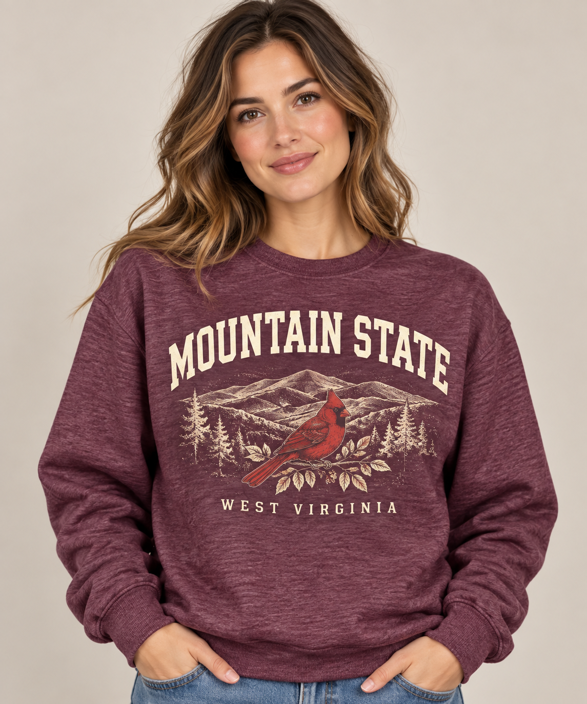 Woman modeling Mountain State West Virginia crewneck in Heather Sport Dark Maroon