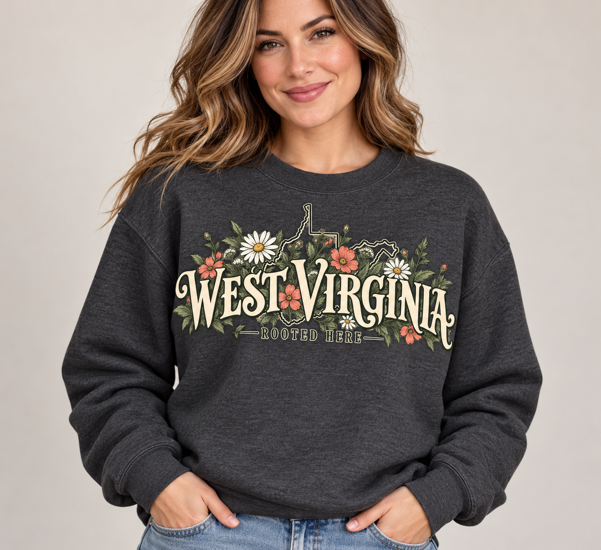 Woman modeling dark charcoal West Virginia Rooted Here crewneck