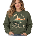 Woman wearing olive green Wild and Wonderful West Virginia crewneck